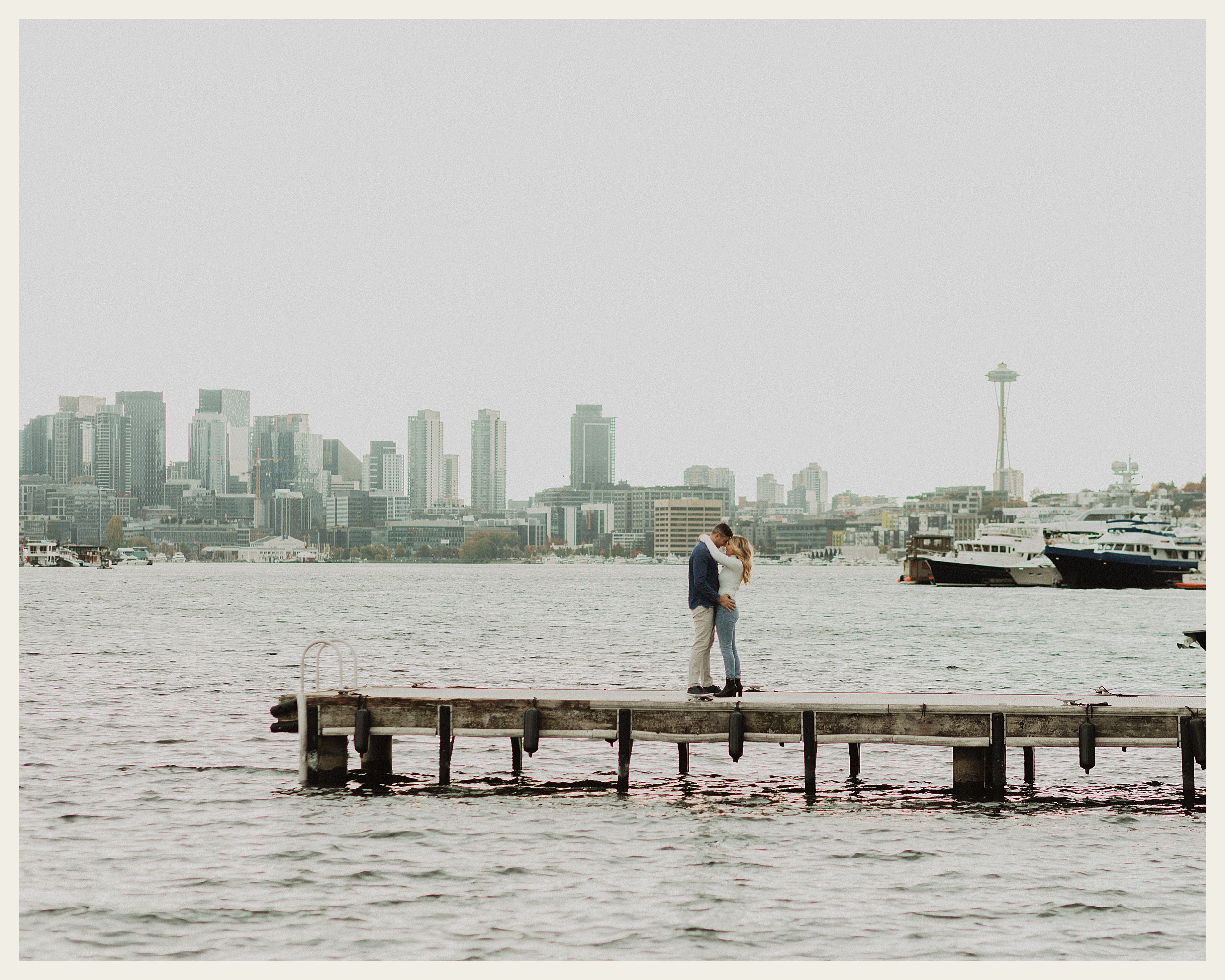 couple standing on boat dock in seattle