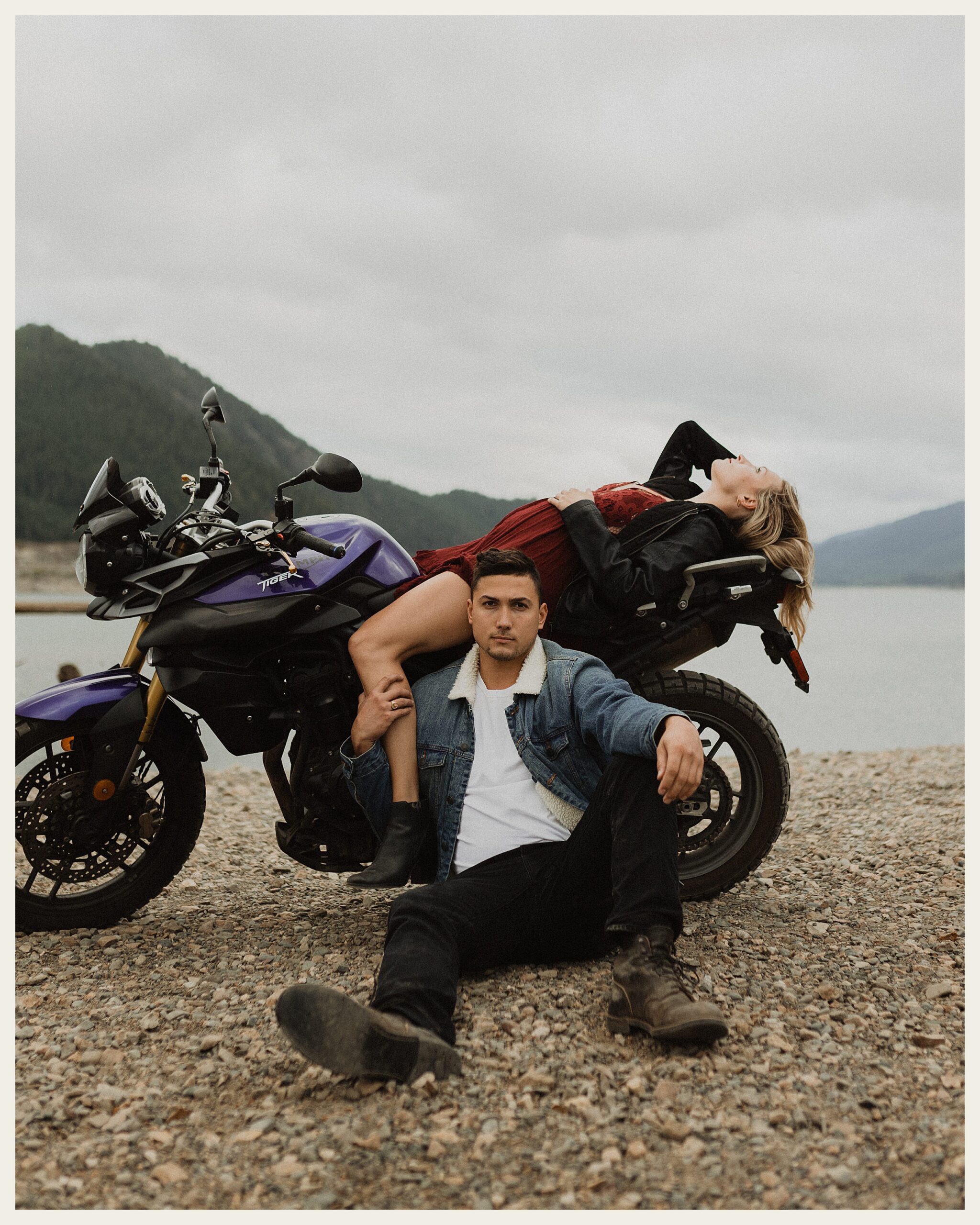couple posing on motorcycle