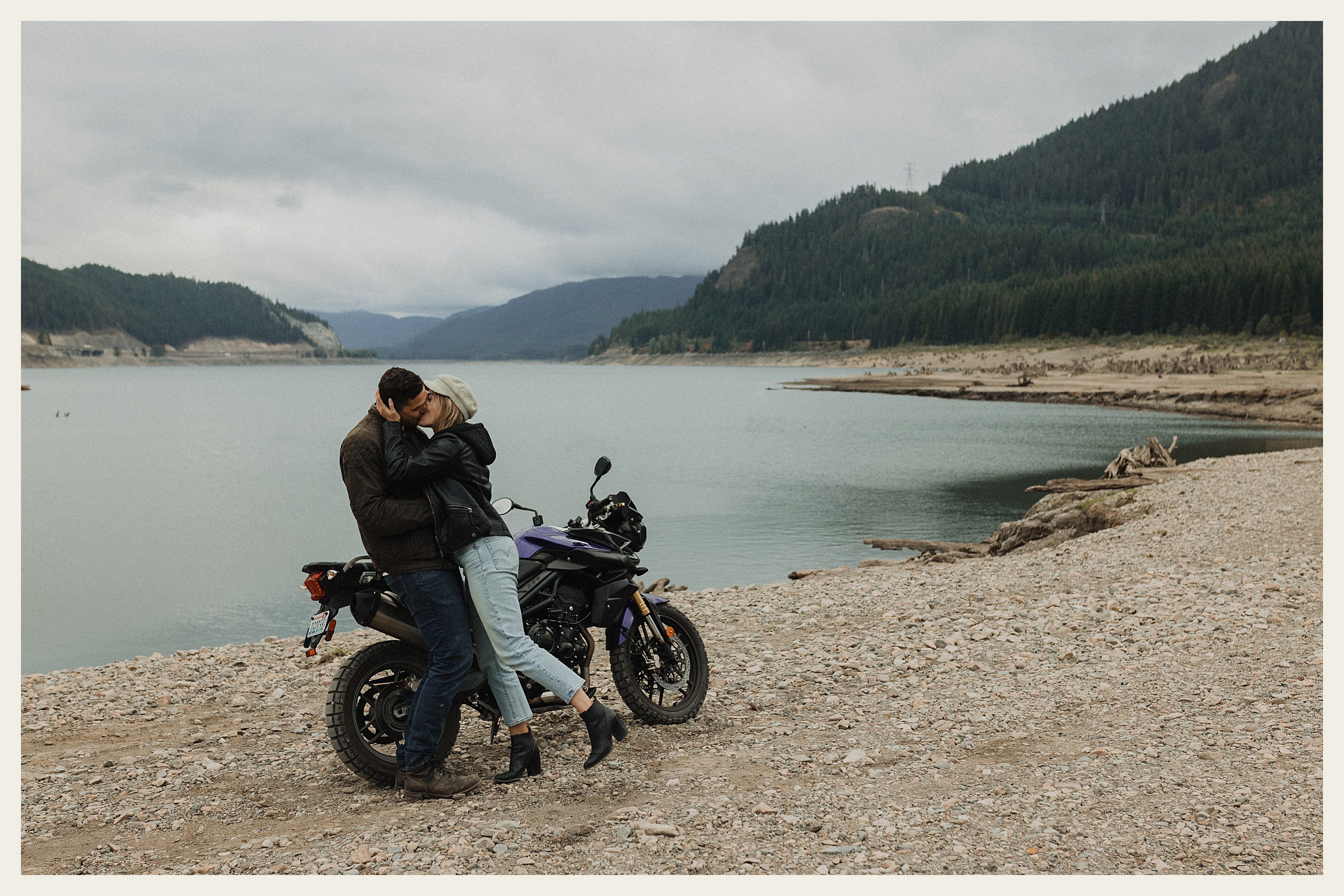 couple kissing on motorcycle