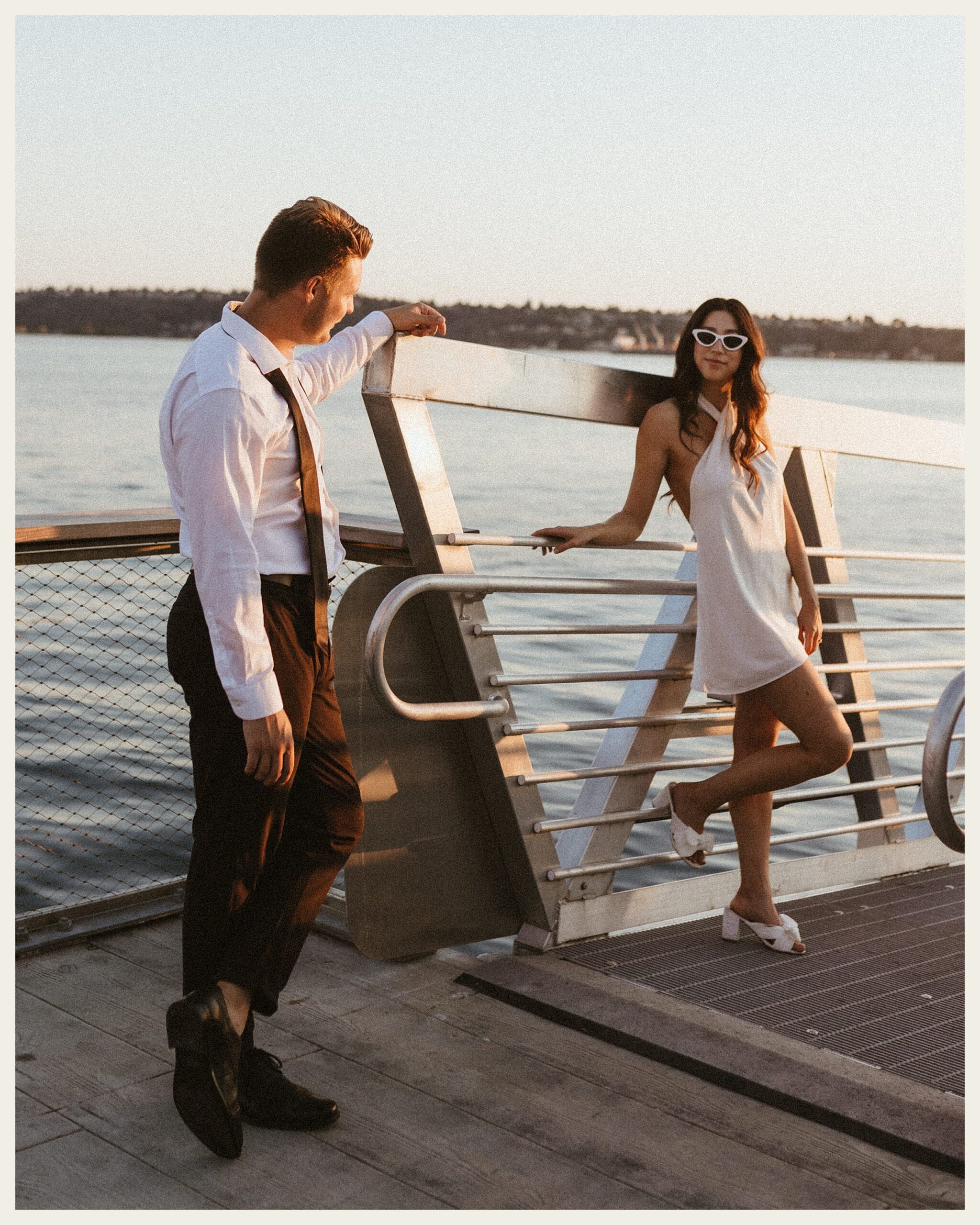couple standing on boat dock