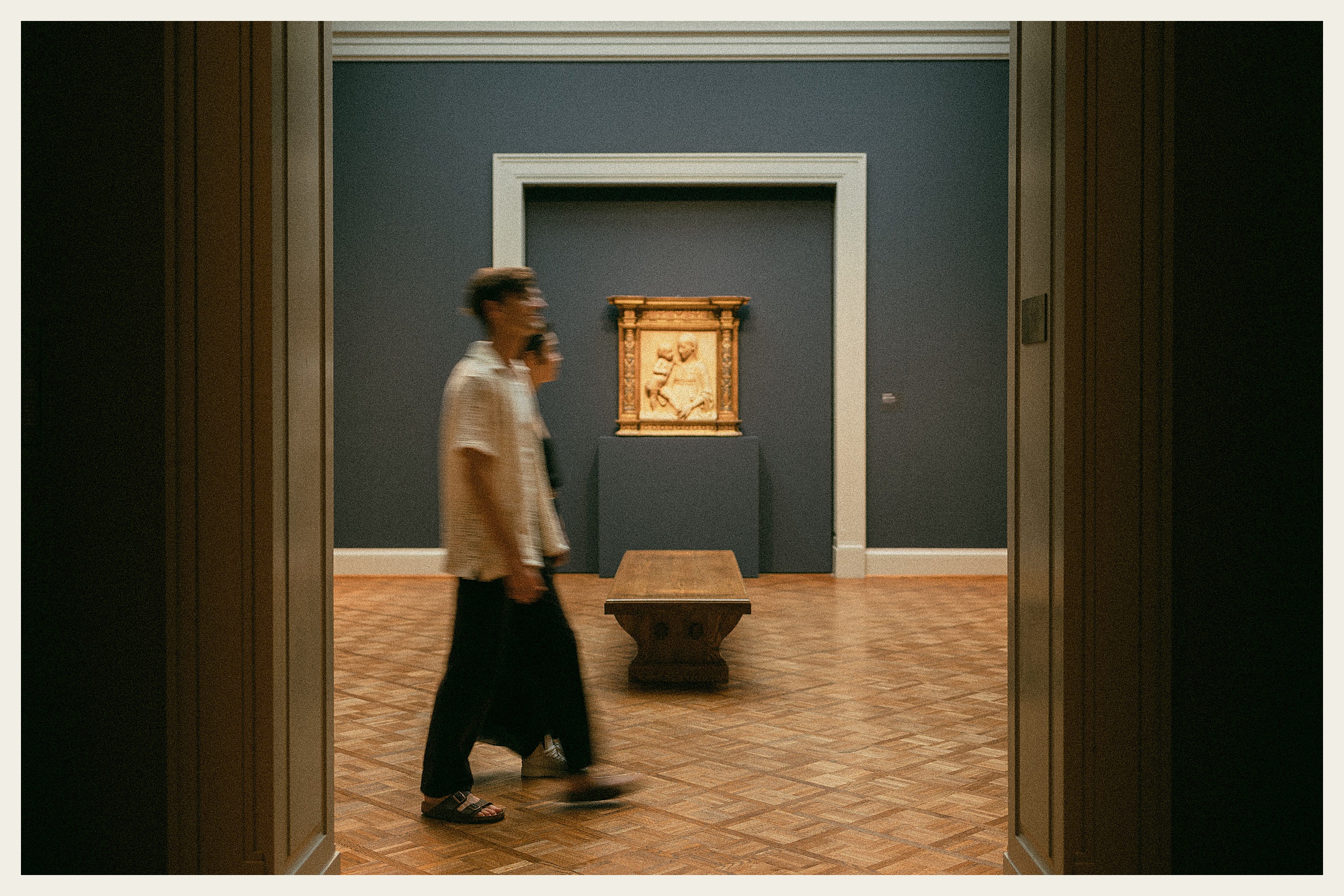 couple walking through art museum